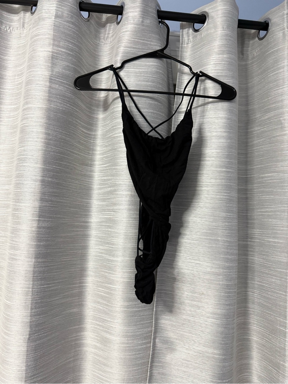 Black Strappy One-Piece Bodysuit